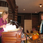 Director Moore awards Summerville Garden Club president Ann Findlater.