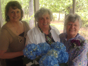 District V Director, Mary Lynda Crockett (center), Perry Garden Club President, Anne Miller, and Carolyn Coker, Perry Garden Club member at Carolyn's 80th birthday party.